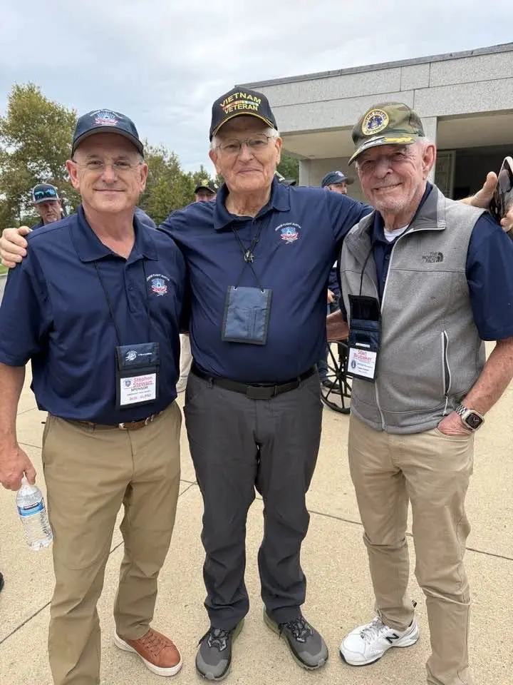 Attorney Stephen Stewart with two veterans on Honor Flight Austin Flight 107 in Washington, D.C.