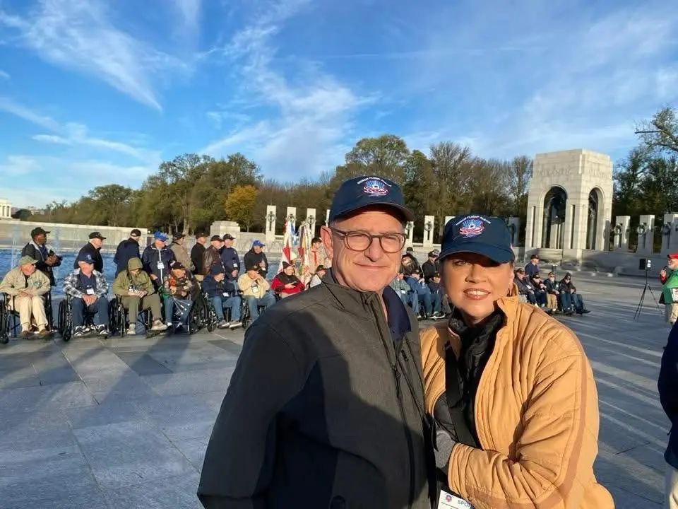 Stephen and Ginger Stewart with Honor Flight Austin veterans at the World War II Memorial